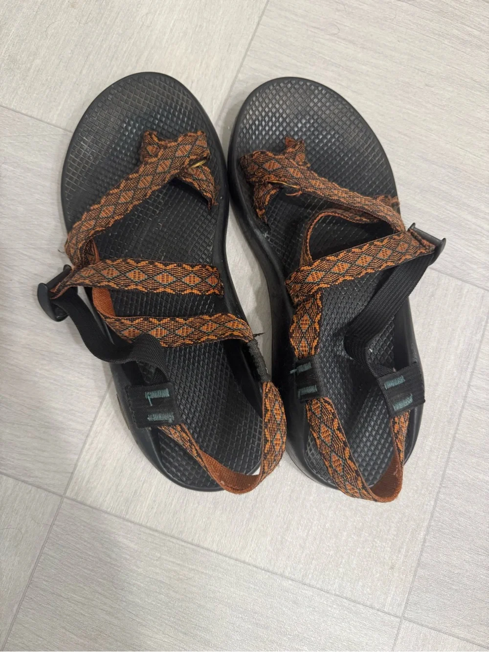 Chaco Men's Black Sandals with Orange & Brown Patterned Straps